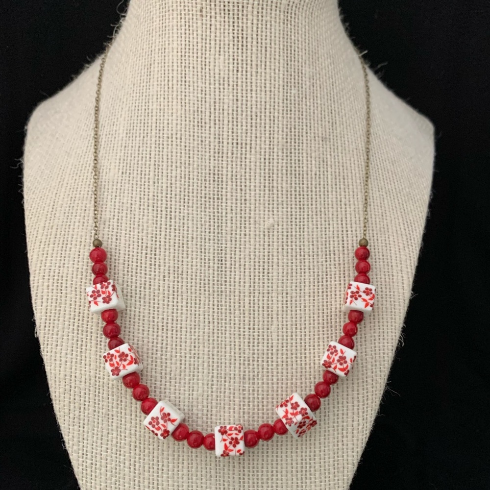 Simple and sweet red beaded necklace with flowers